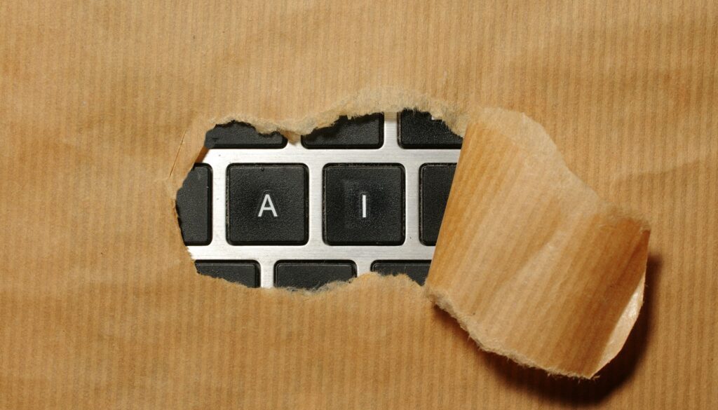 Keyboard with 'AI' visible through tear