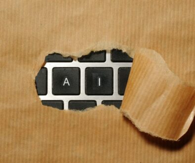Keyboard with 'AI' visible through tear